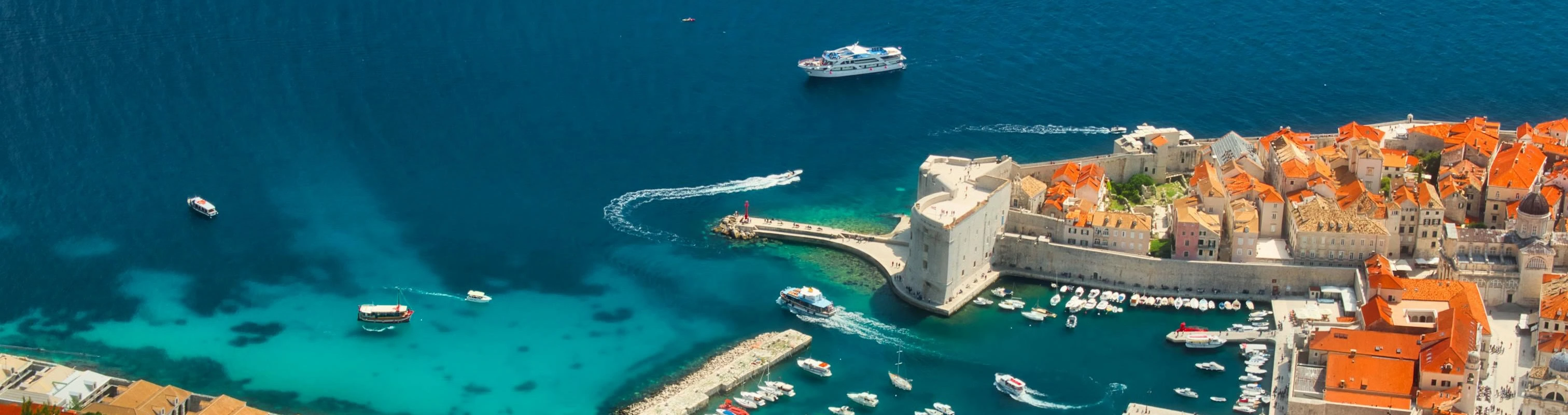 A scenic view of Dubrovnik port and the Adriatic coastline